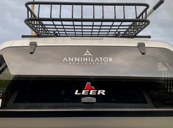 annihilator logo placed on a log