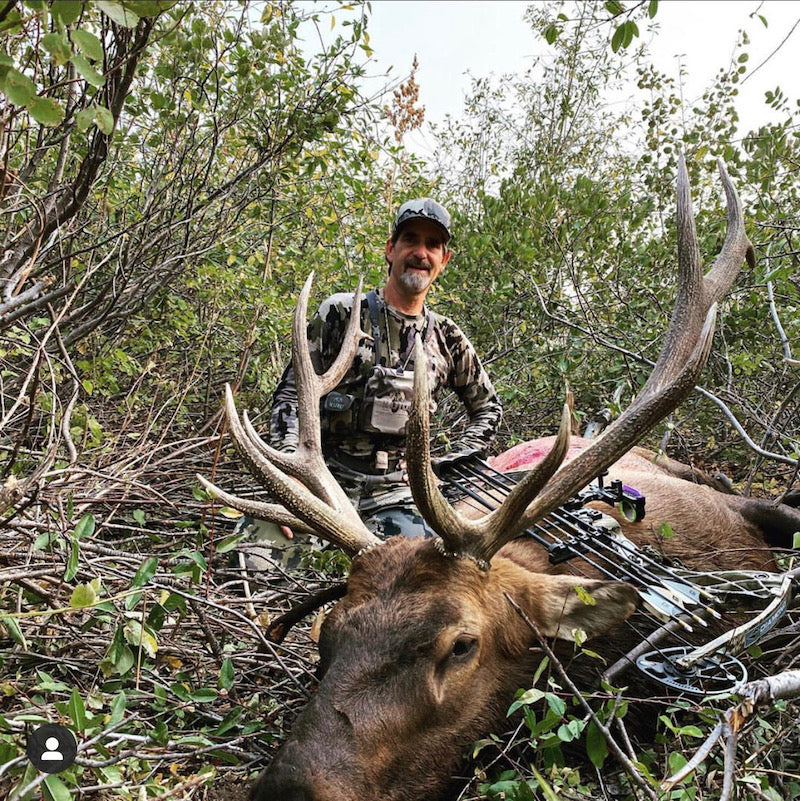 hunter in the woods chasing an animal