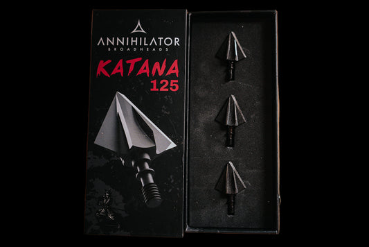 Three Katana 125 grain broadheads displayed in an open box, with the Annihilator Archery logo and the product name visible.
