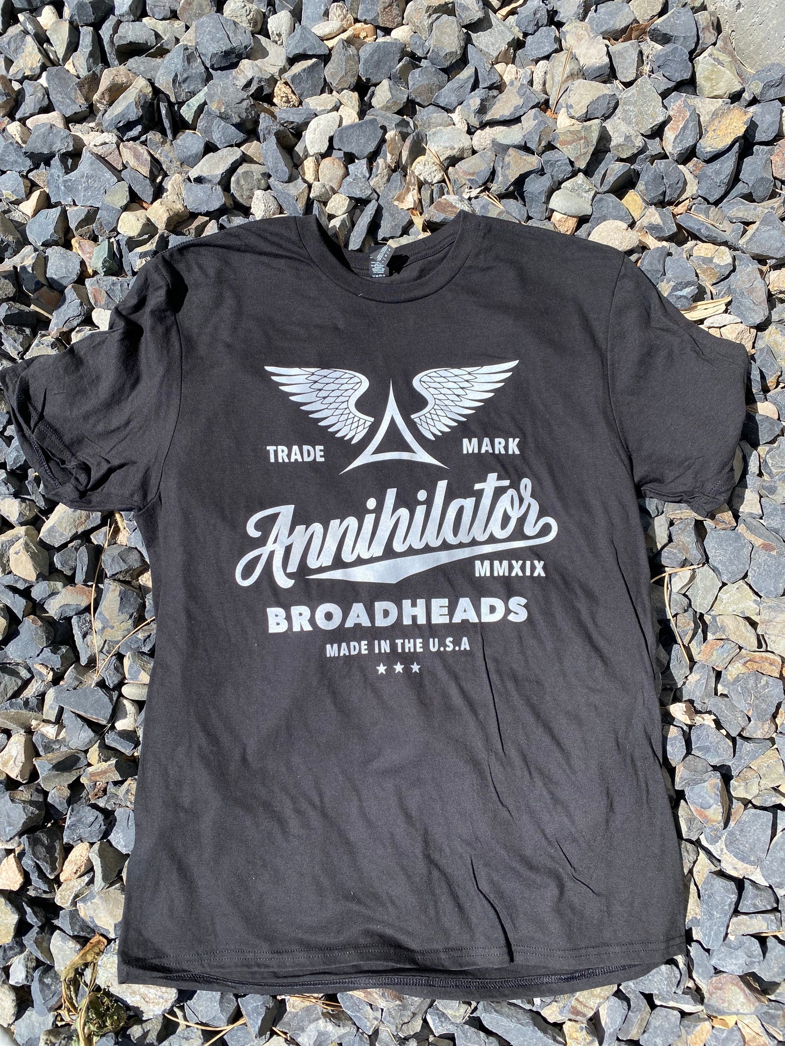 tshirt with aniihilator logo in cursive